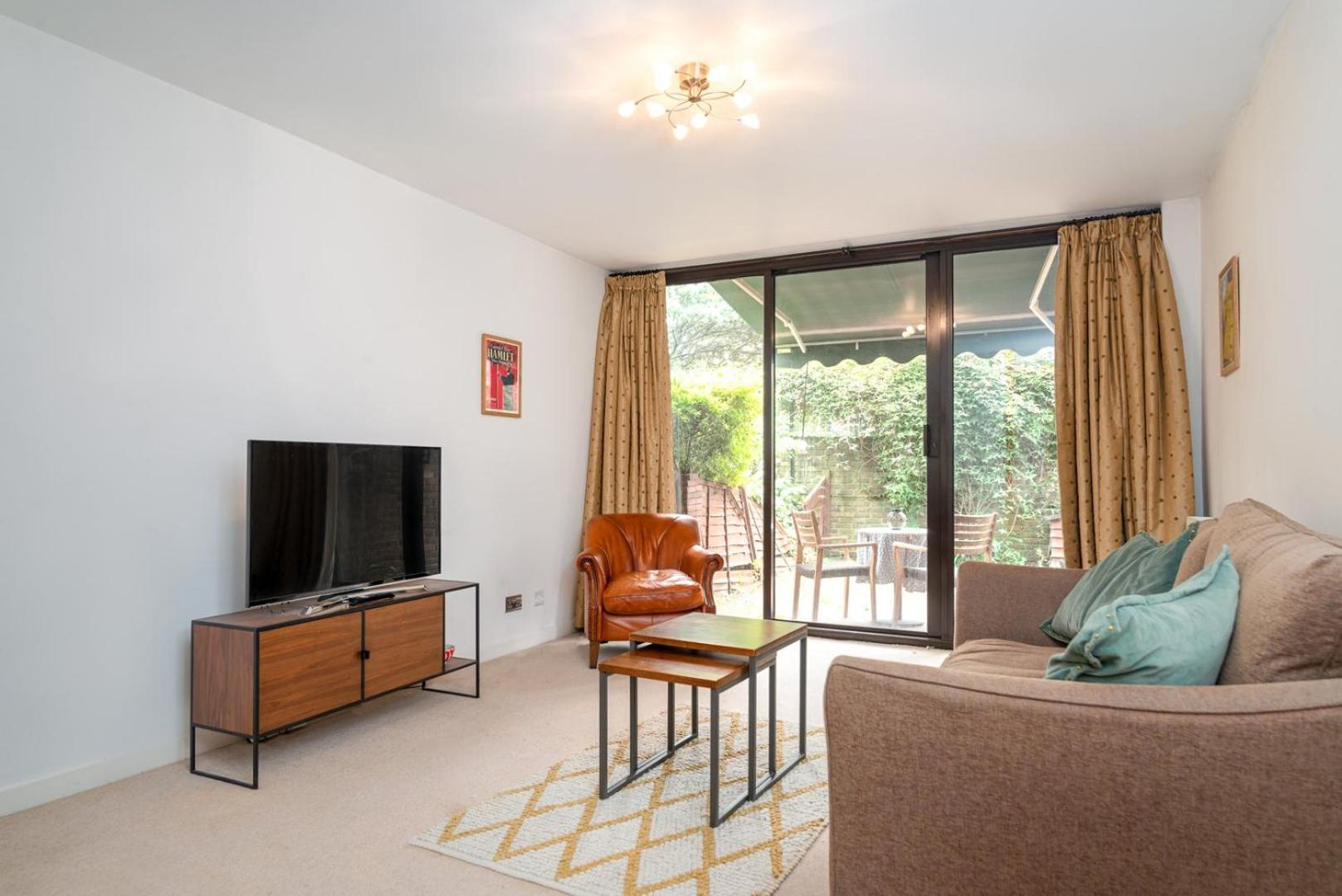 Ferienwohnung Guestready - Lovely Ground Floor Duplex With Patio In Southbank London Exterior foto